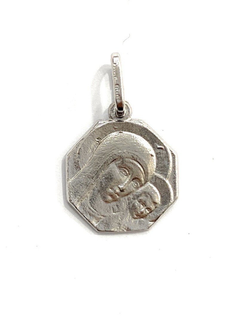 medalla comunión octogonal Virgen del Camino Neocatecumenal en plata de ley.

Tamaño medalla: 13mm