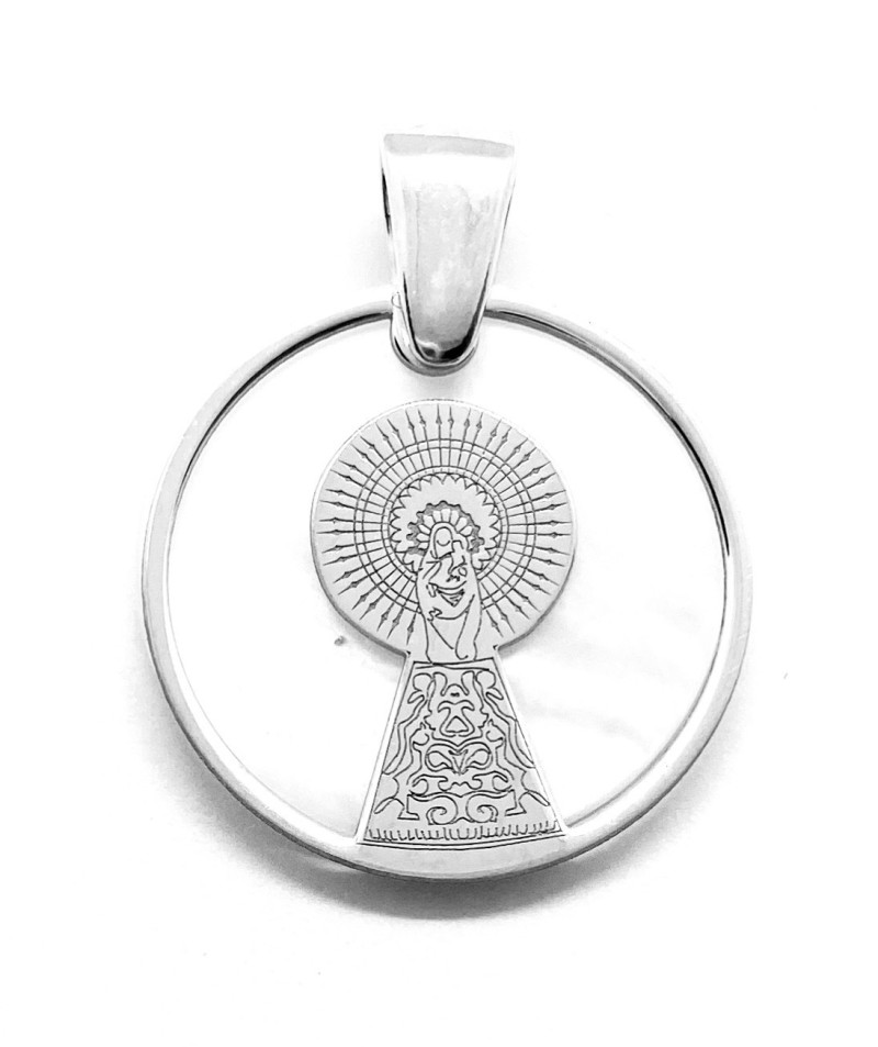 Medalla comunión Virgen del Pilar en plata de ley y nácar.

Tamaño medalla: 20mm