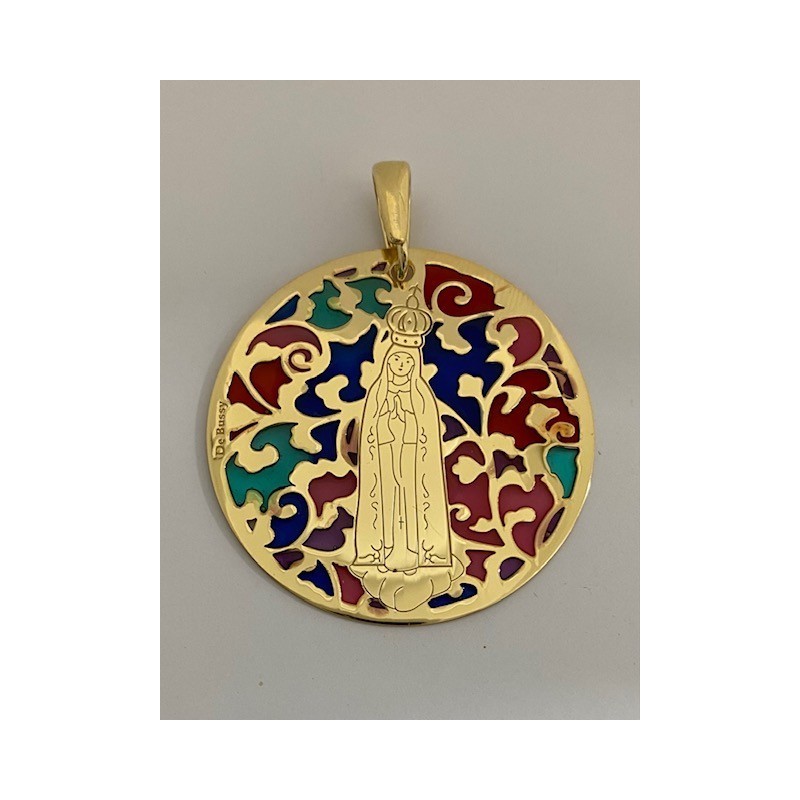 Medalla exclusiva De Bussy Virgen de Fátima en plata de ley 925ml cubierta de oro de 18 Kt y esmalte.

Tamaño: 35mm.